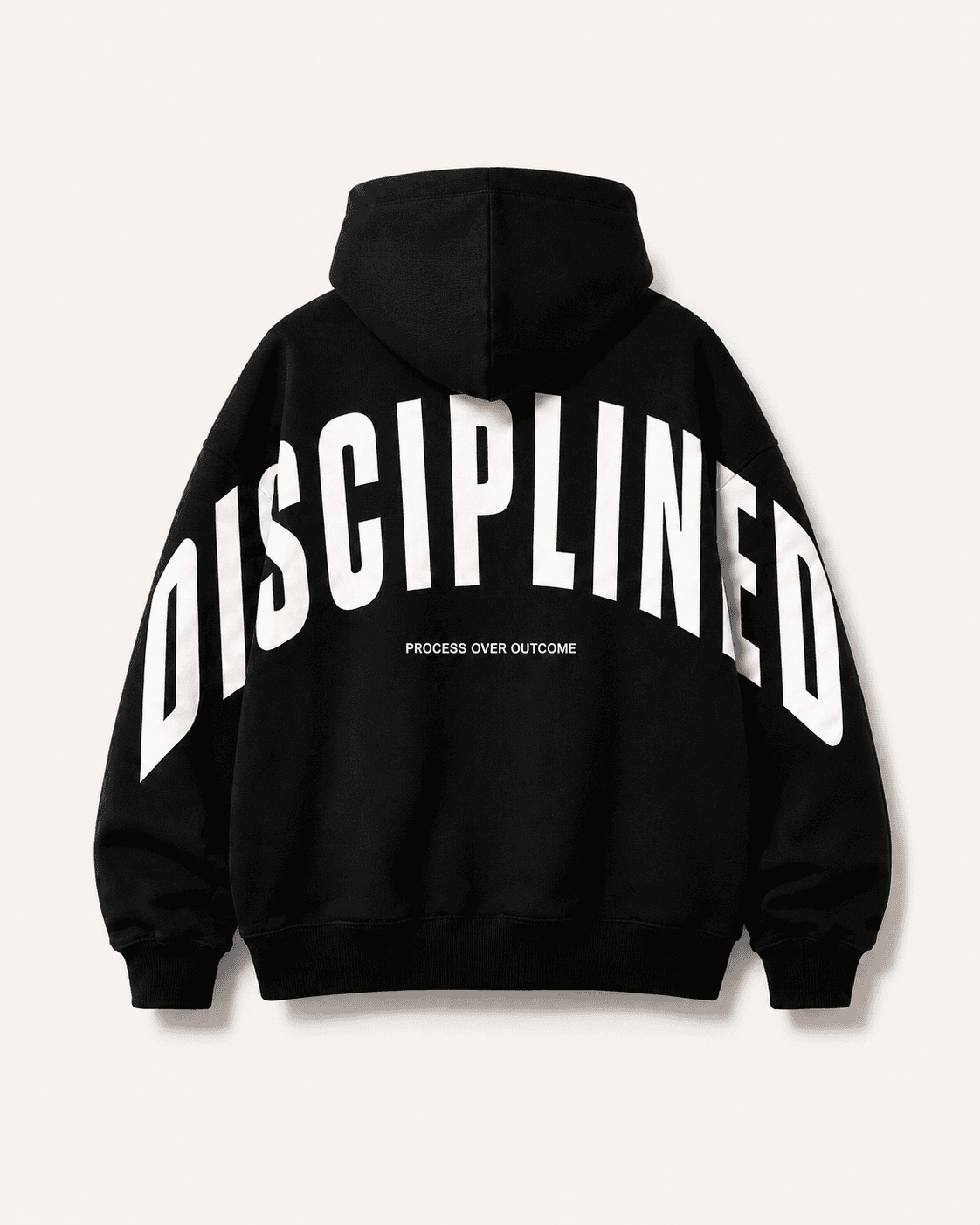 The Disciplined heavyweight hoodie, anchor piece of the Drop 001 full set: an arched DISCIPLINED screen print over PROCESS OVER OUTCOME, on black.